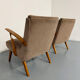 Set of 2 vintage wooden and fabric armchairs designed in the 1960s.