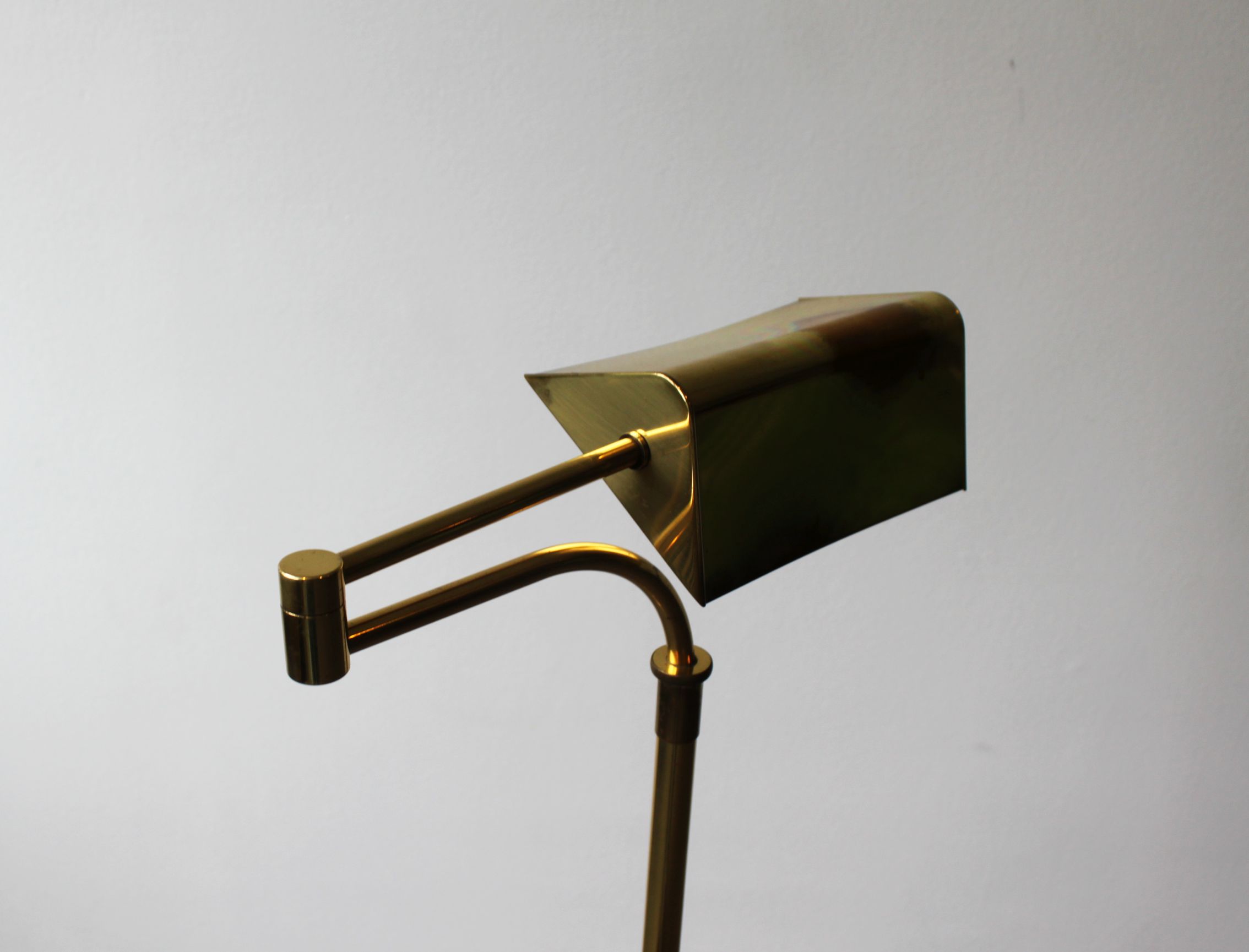 Gilded brass articulated reading light, France, 70's.