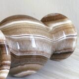 Natural stone vase with marbled patterns.