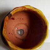 Old provencal pot cover in glazed terracotta