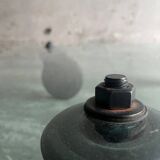 Gae Aulenti coffee table for Fontana Arte, transparent glass top with black cast iron supports, 1980s.