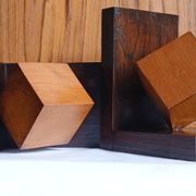 Cubist pair of bookends made of stained solid wood, 1960.