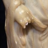 Soapstone sculpture on obsidian base of a Buddhist.