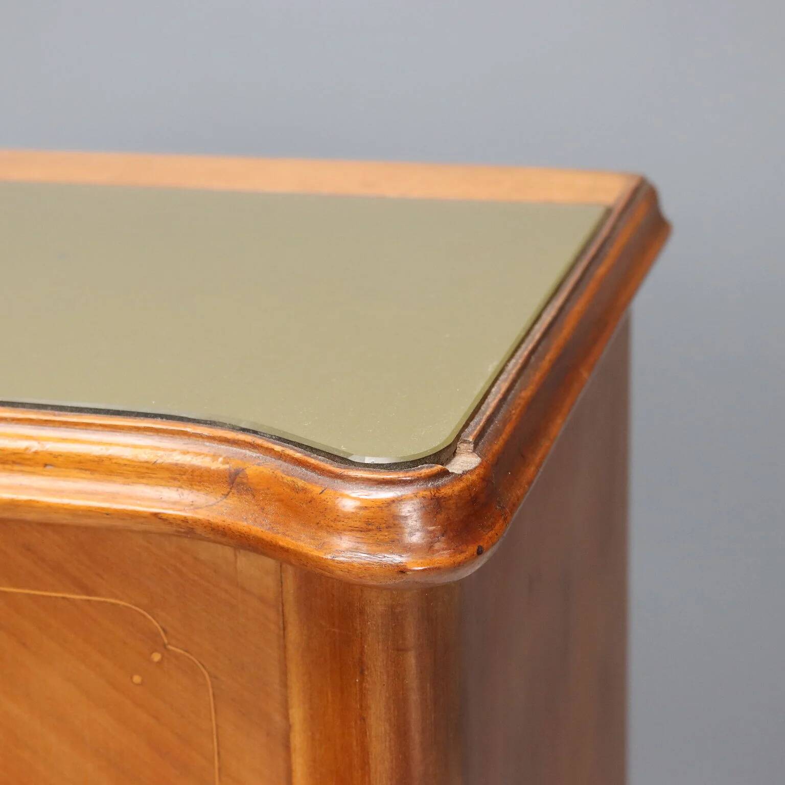 Pair of wooden and glass bedside tables from the 1950s.