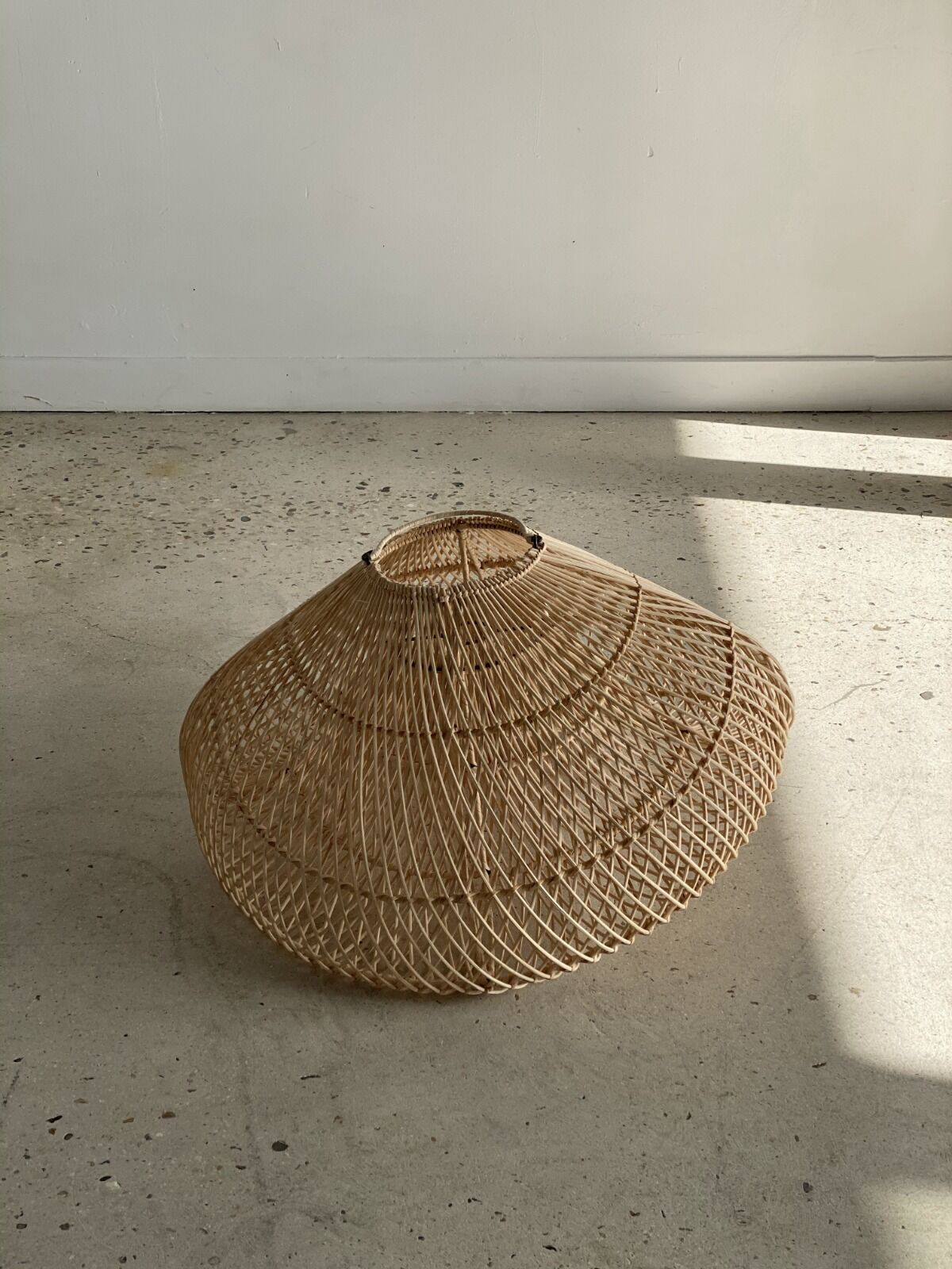 Small rattan lampshade in the shape of a braided hat