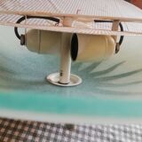 White opaque glass ceiling light and golden metal sun