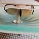 White opaque glass ceiling light and golden metal sun