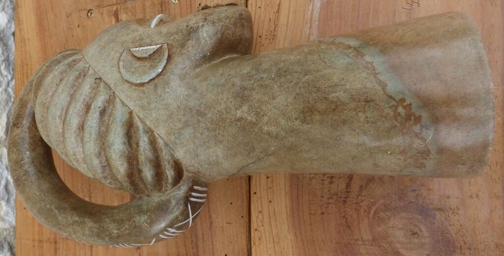 African woman sculpture in stone