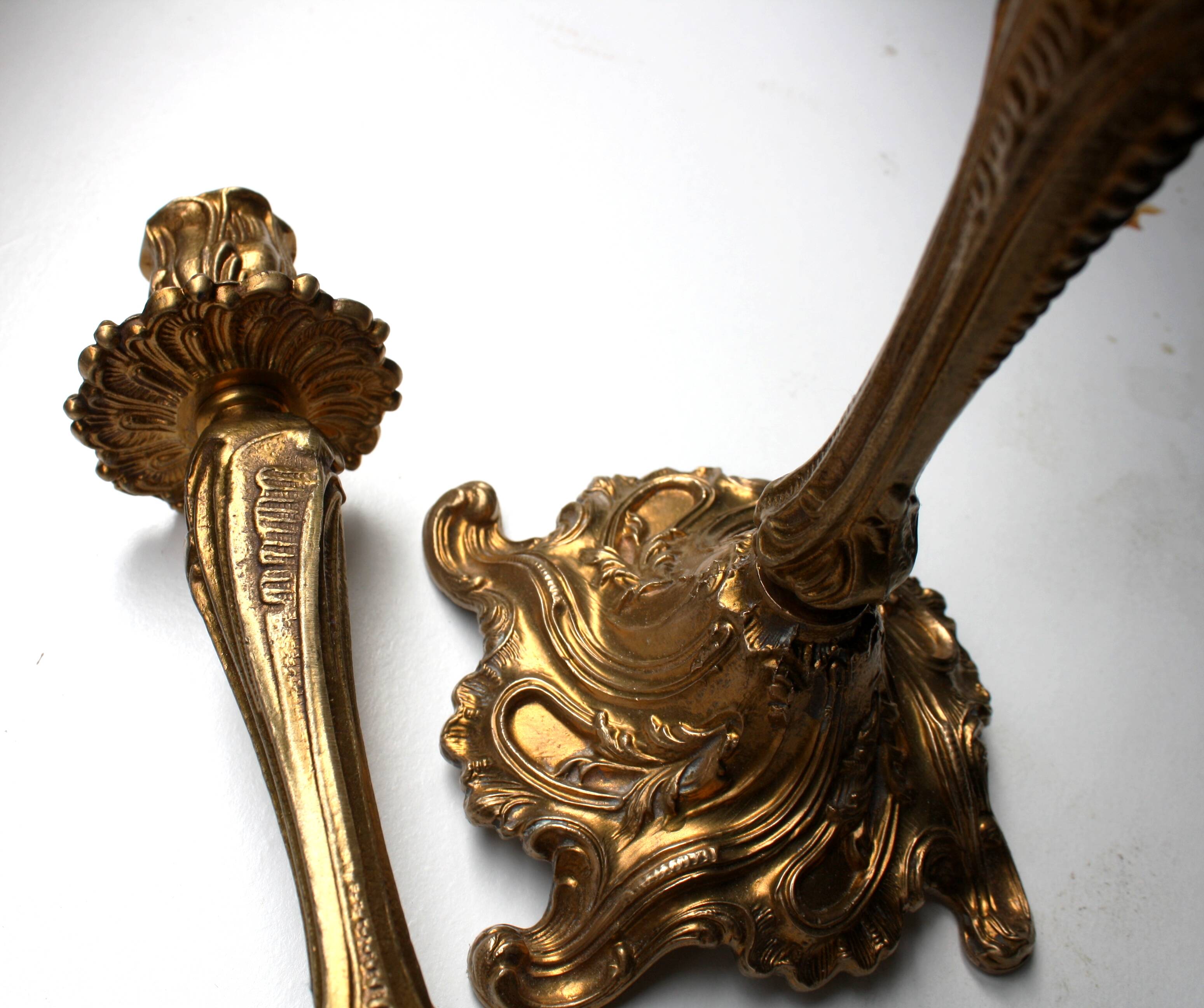 Pairs of Louis XV style gilded bronze candlesticks