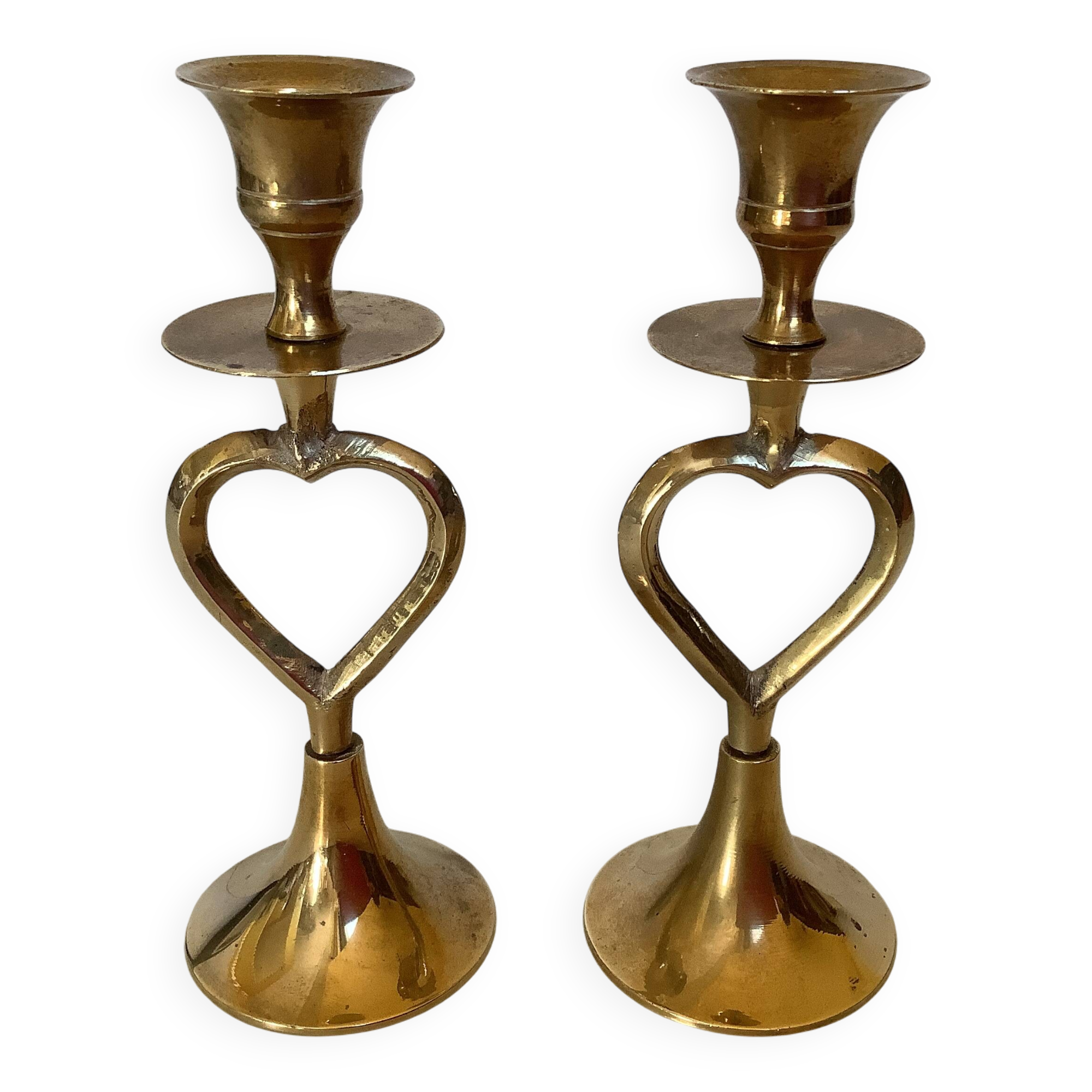 Pair of small brass heart candlesticks