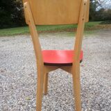 Eight wooden and formica chairs