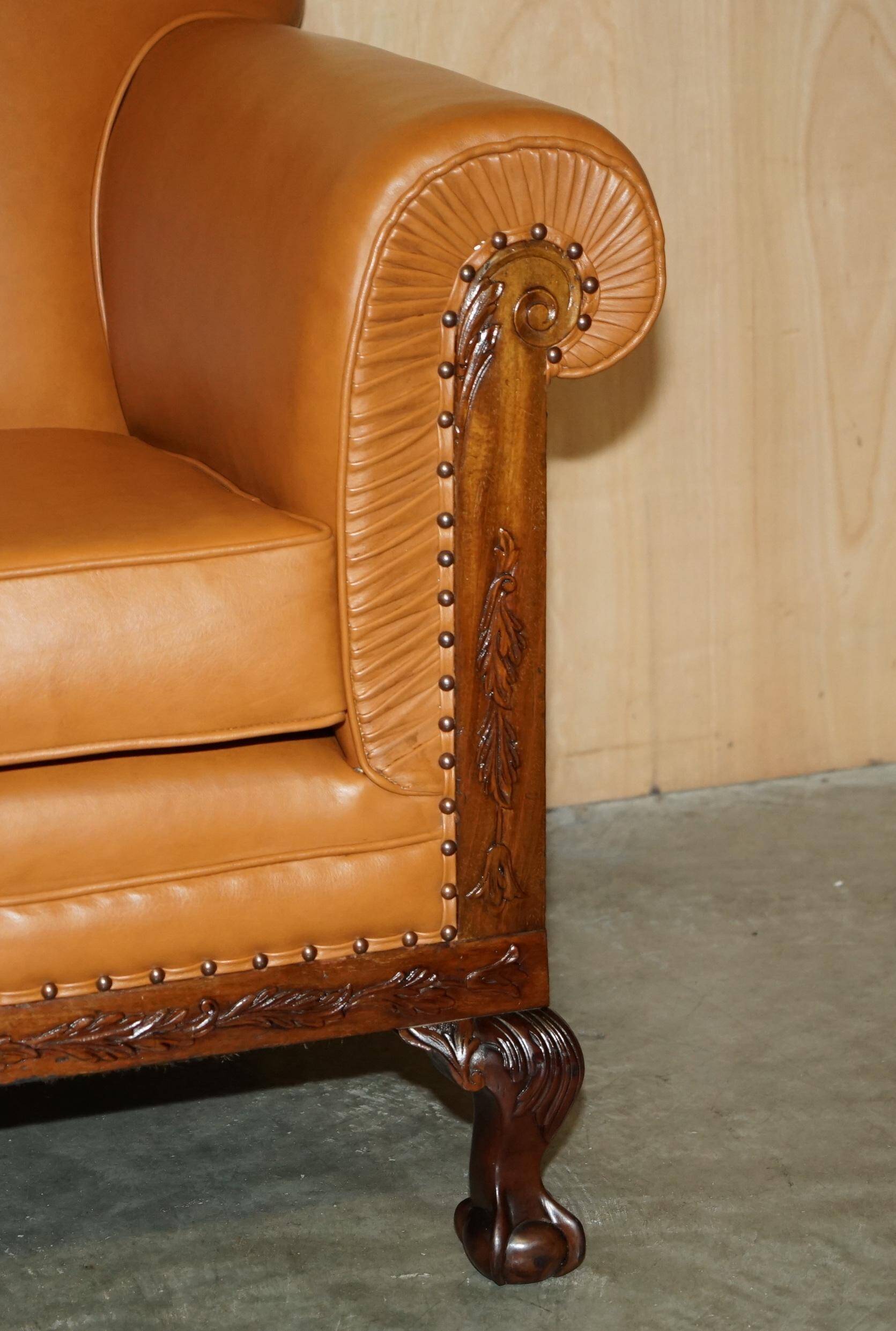Restored three-seater leather canapé in late Victorian style.