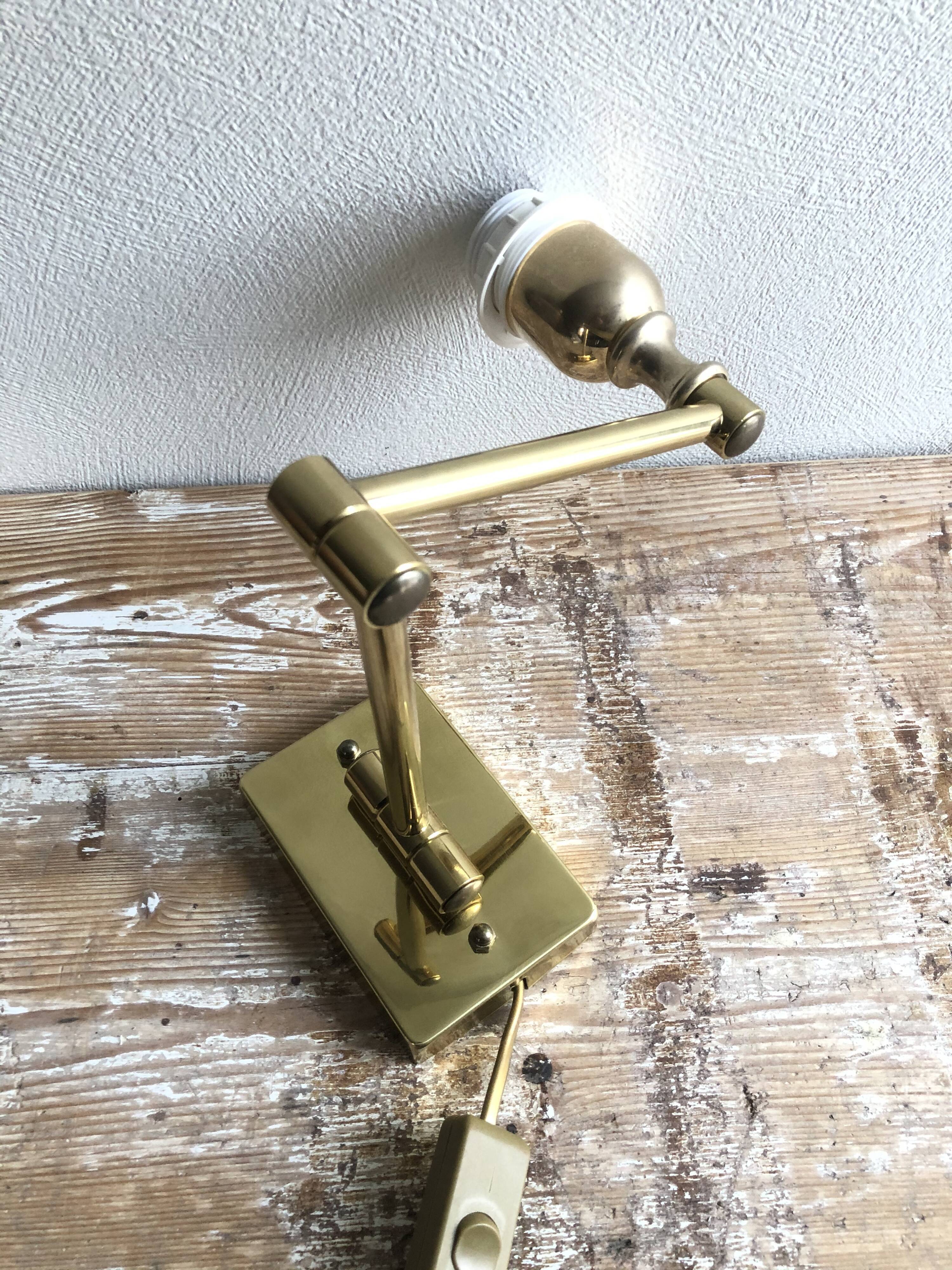 Deschuytener brass articulated wall lamp
