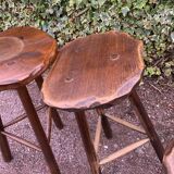 Set of three brutalist tripod stools