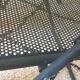 Pair of folding chairs in perforated metal