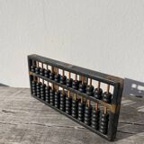 Black wooden Chinese abacus