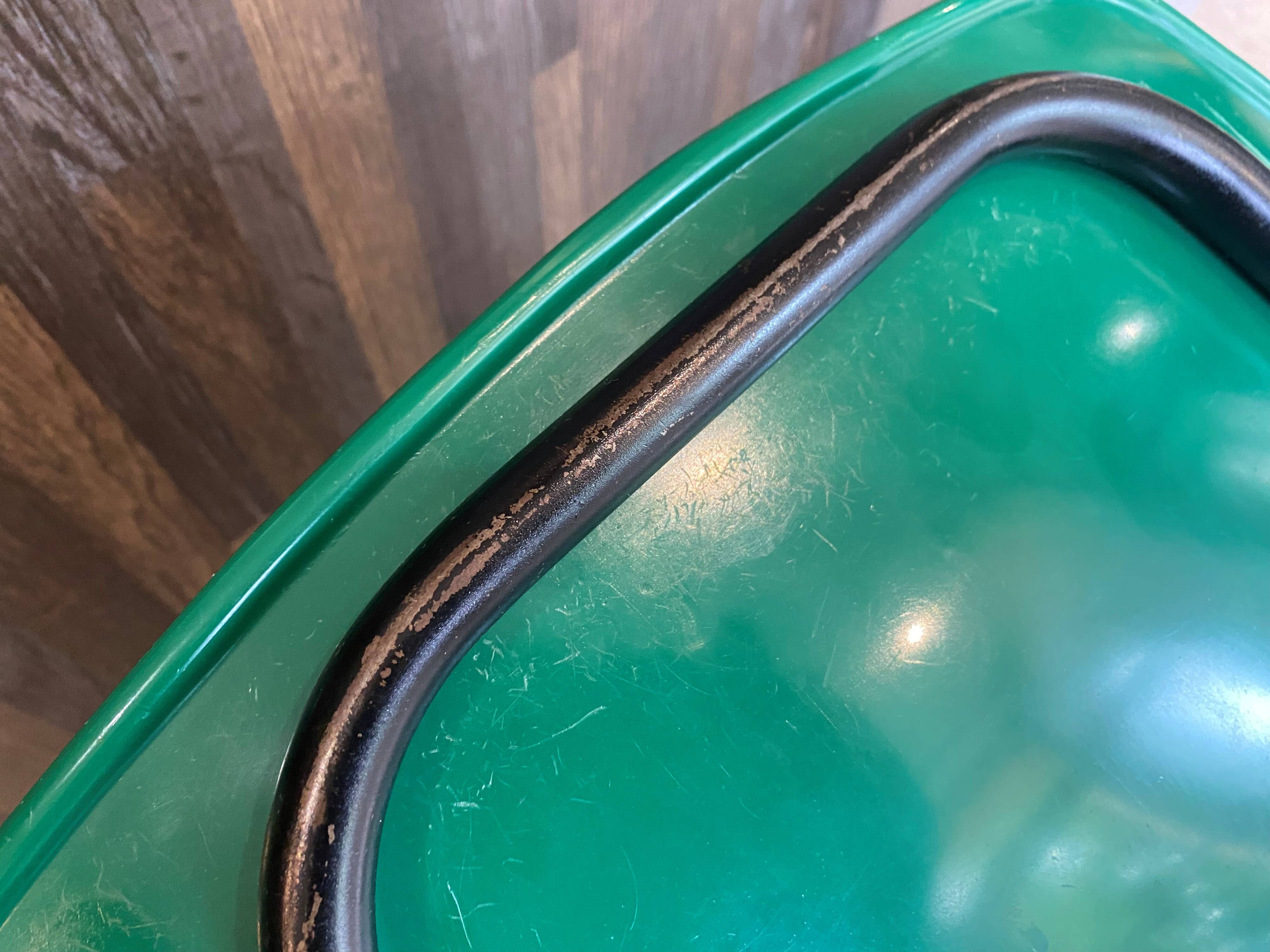 A shell chair by Pierre Guariche for Meurop in vintage green from the 1960s.