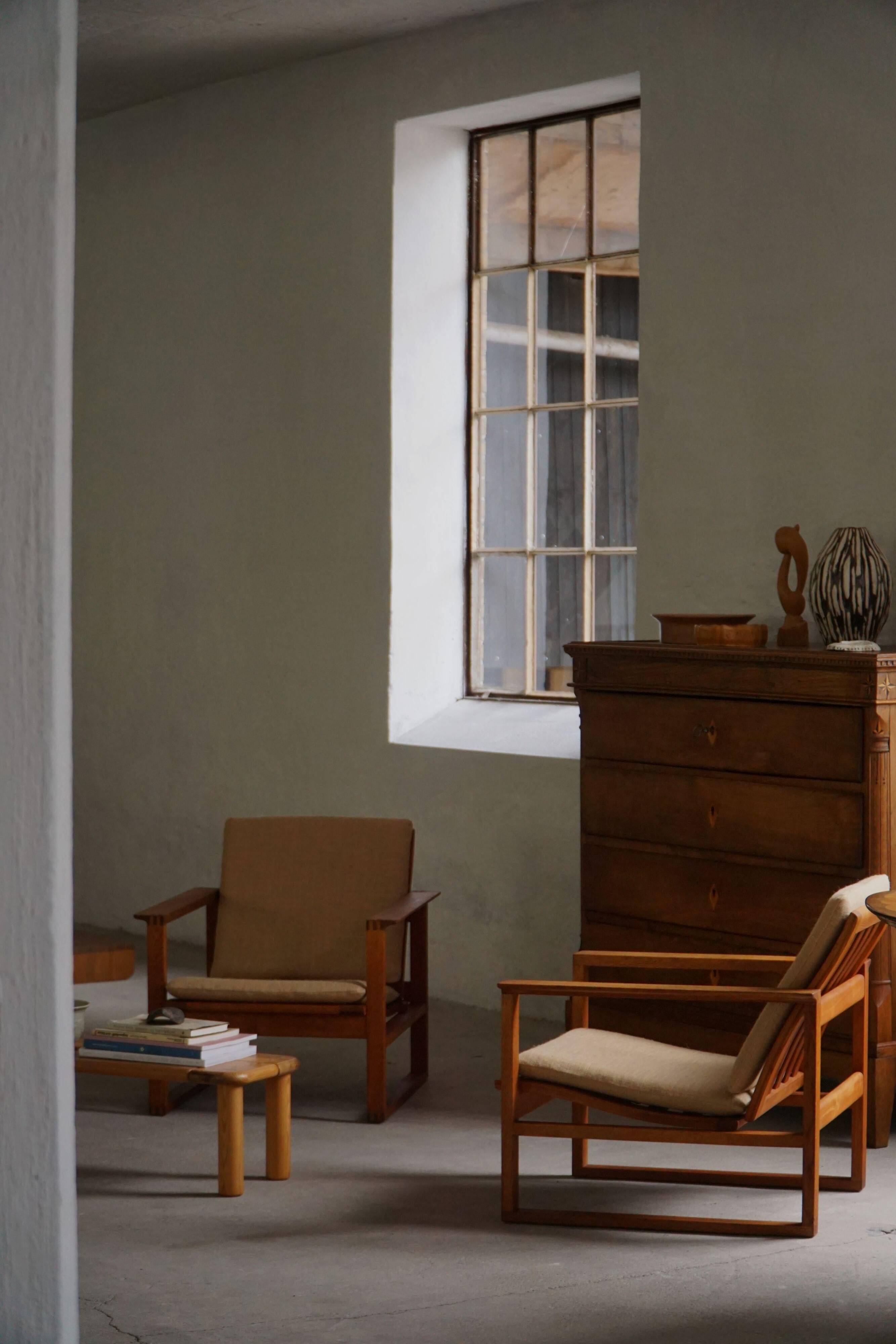 Børge Mogensen, a pair of BM2256 lounge chairs in oak and jute, Denmark, 1960s.