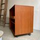 Danish storage cabinet Komfort on teak and rosewood wheels