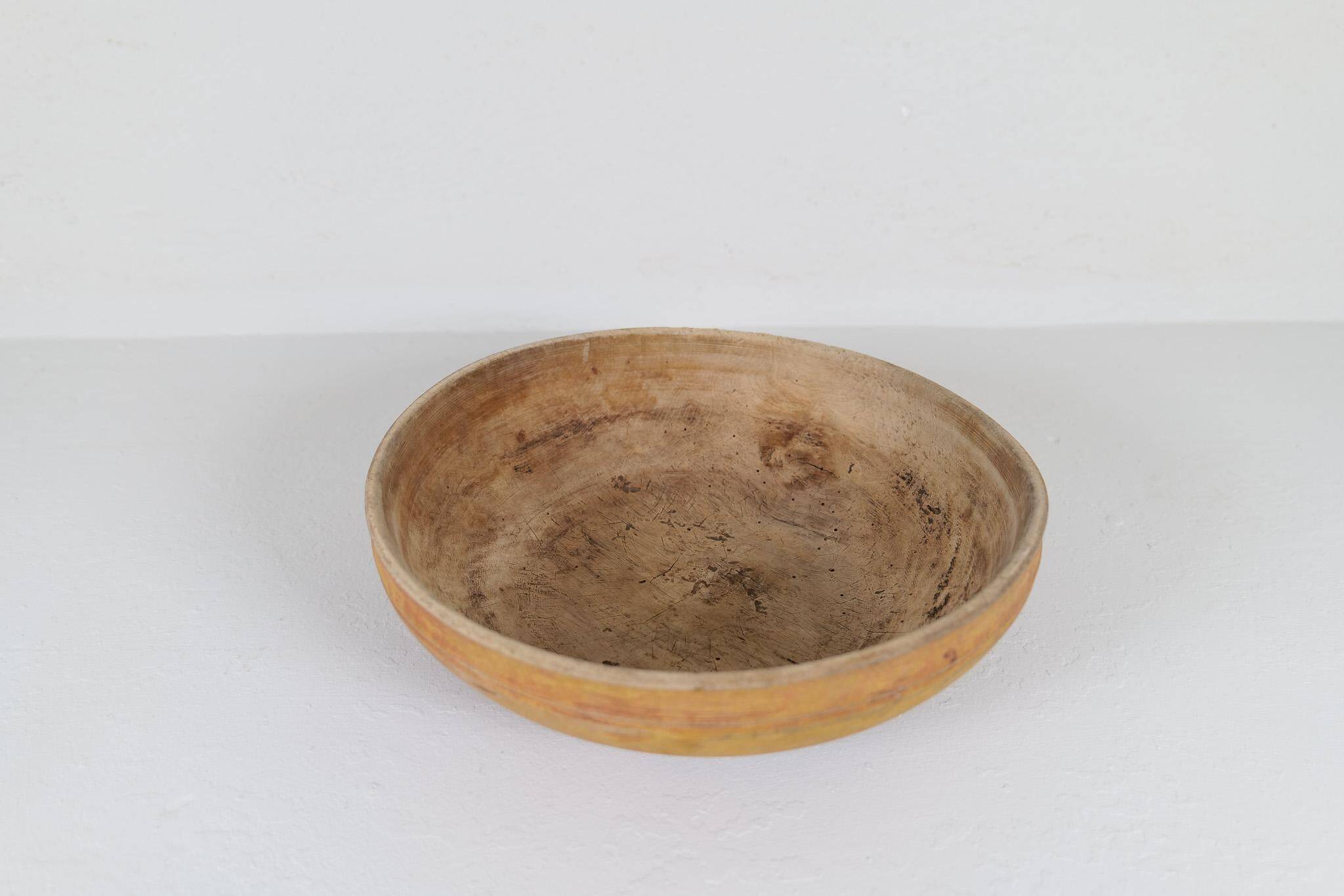 Set of three unique farmhouse bowls from 19th-century Swedish folk art.