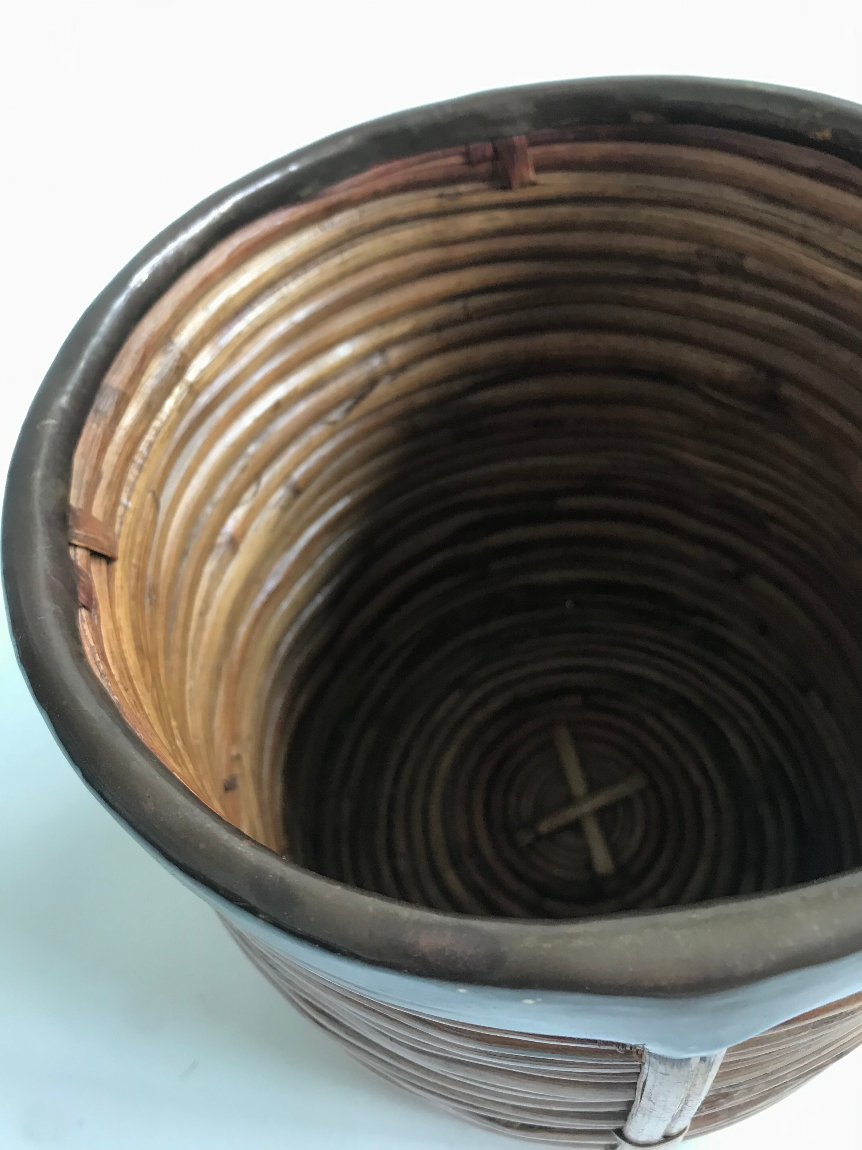 Rattan and brass planter