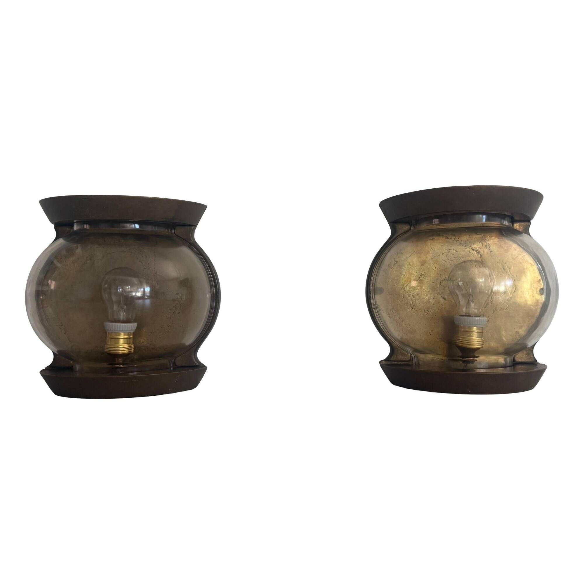 Pair of bronze and glass wall lights from the mid-century, 1960, Italy.