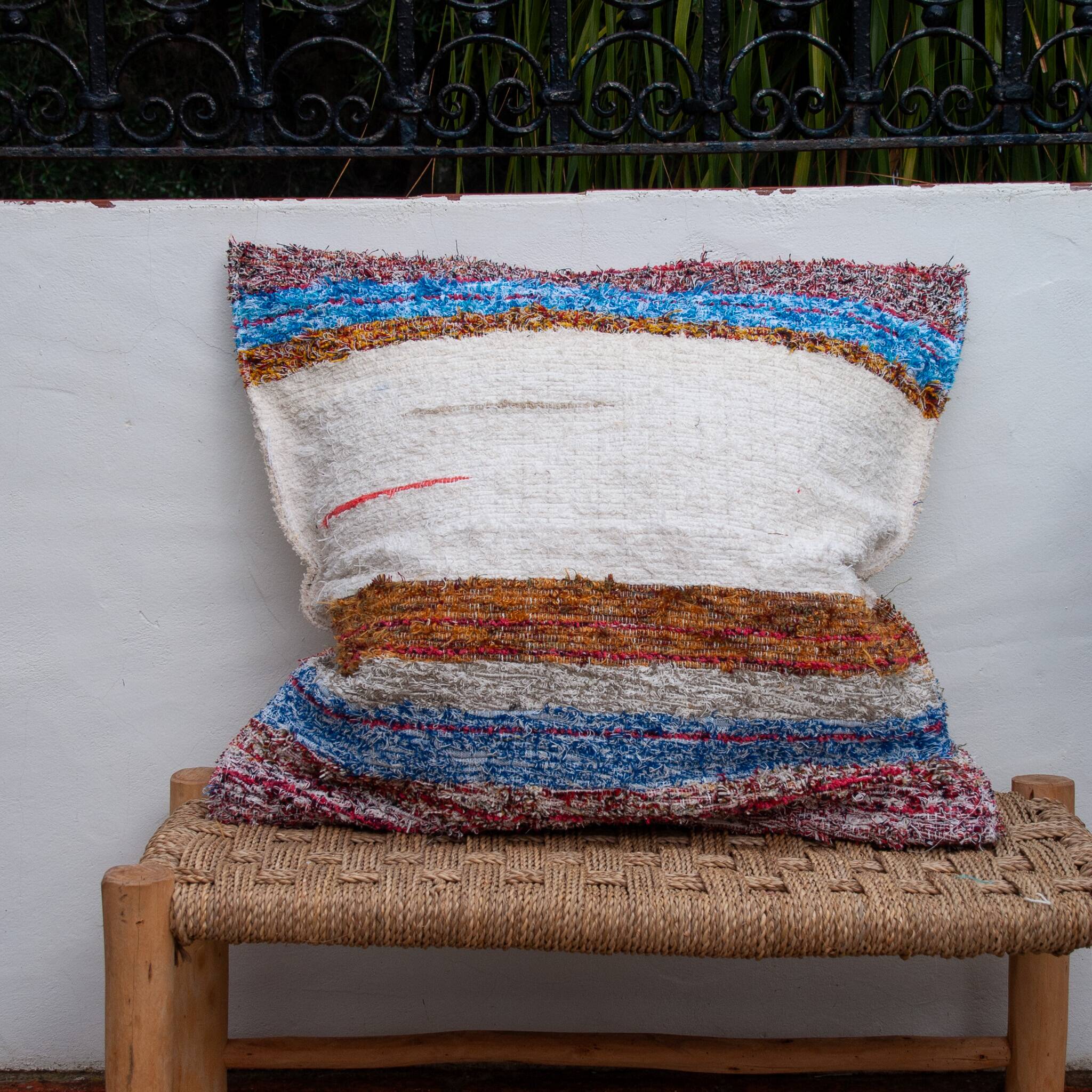 Handwoven cushion cover made from recycled cotton