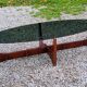 Designer coffee table by Hugues Poignant in rosewood and smoked glass from the 70s