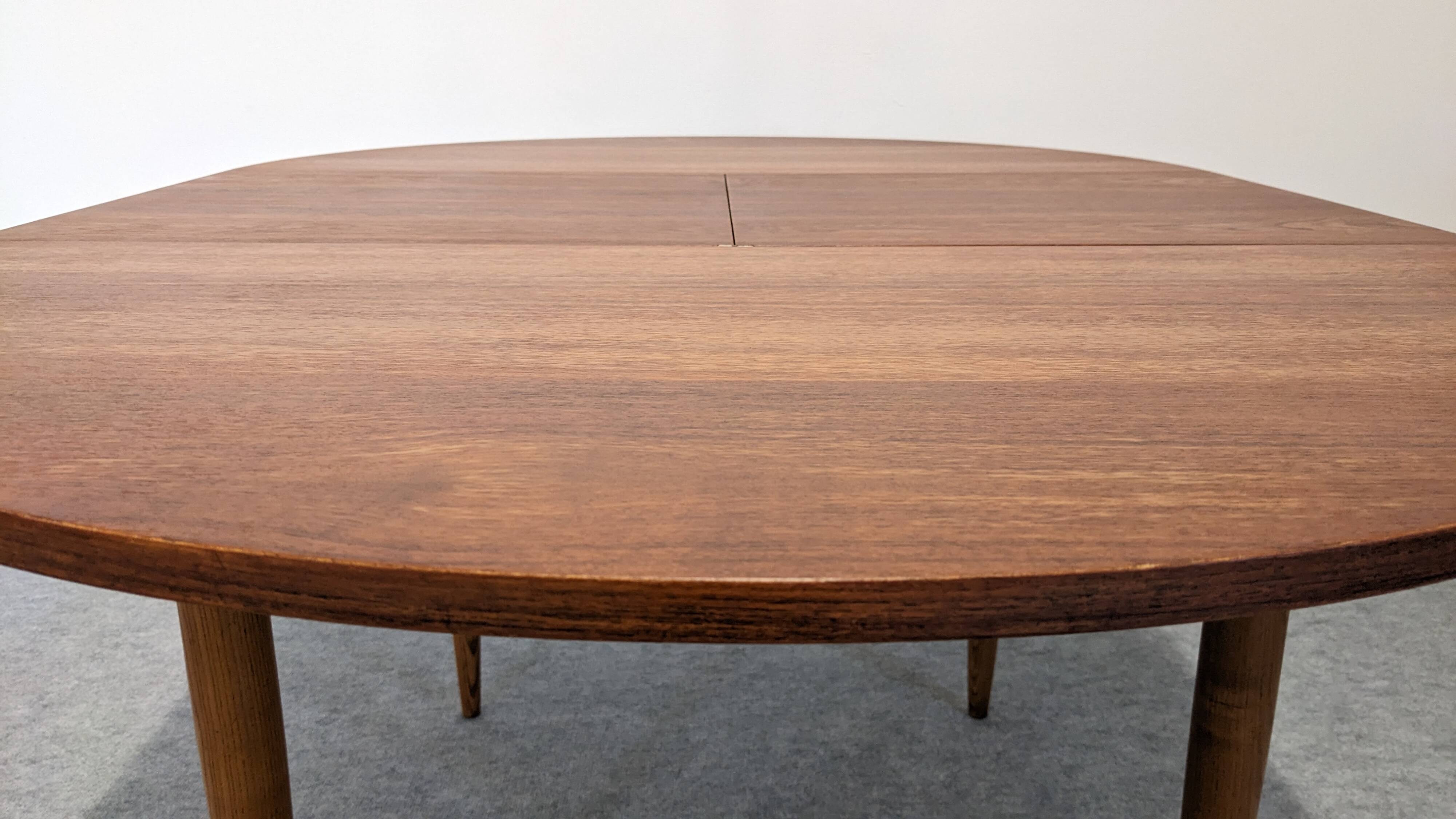 Extendable round table in Scandinavian style made of teak, France circa 1960.