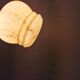 Small Art Deco hanging lamp in cream colored glass with bakelite top. Estimated 1950s