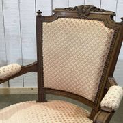 Paire de fauteuils Louis XVI début XXème en noyer