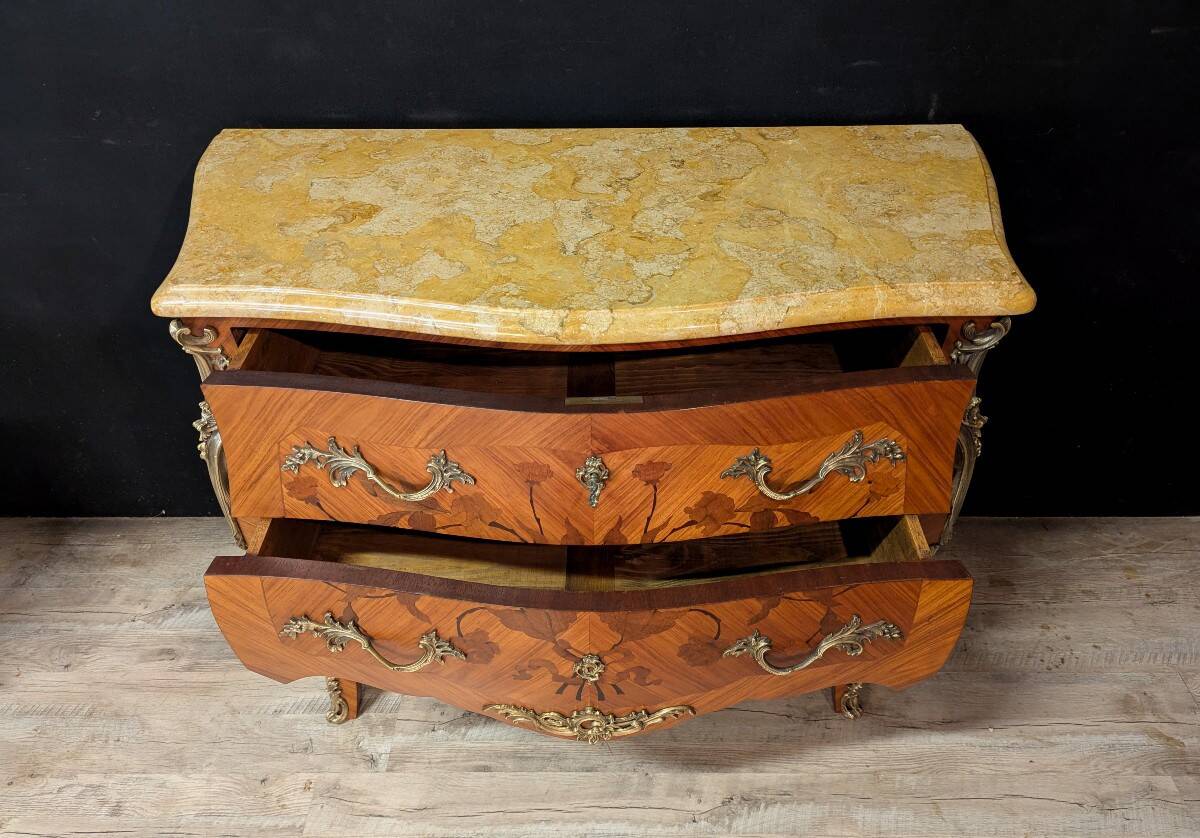Louis XV style commode with marquetry and its pair of bedside tables.