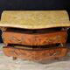 Louis XV style commode with marquetry and its pair of bedside tables.
