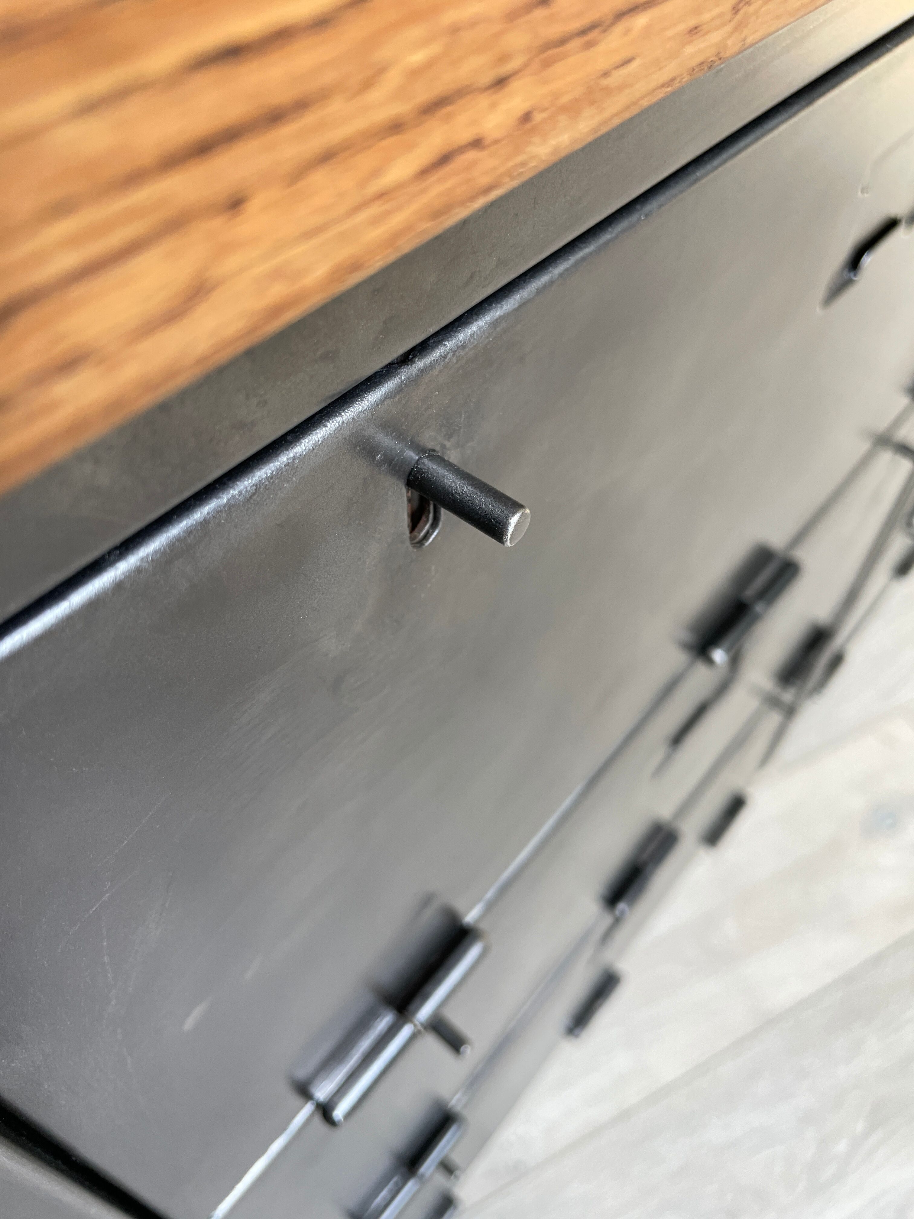 Industrial row in metal and oak.