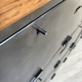 Industrial row in metal and oak.