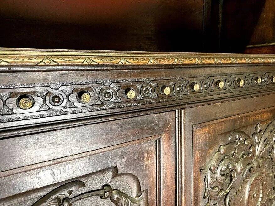 Renaissance-style sideboard, entirely made of walnut and richly carved.