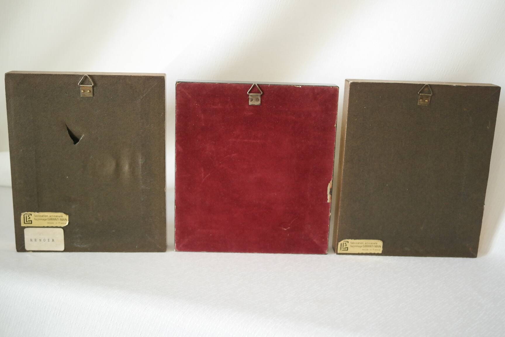 Trio of reproductions of famous vintage painters' tableaux.