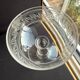 6 Baccarat champagne coupes with Greek engraving, slanted.