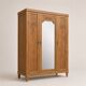 Art deco wardrobe in raw oak with bevelled mirror.