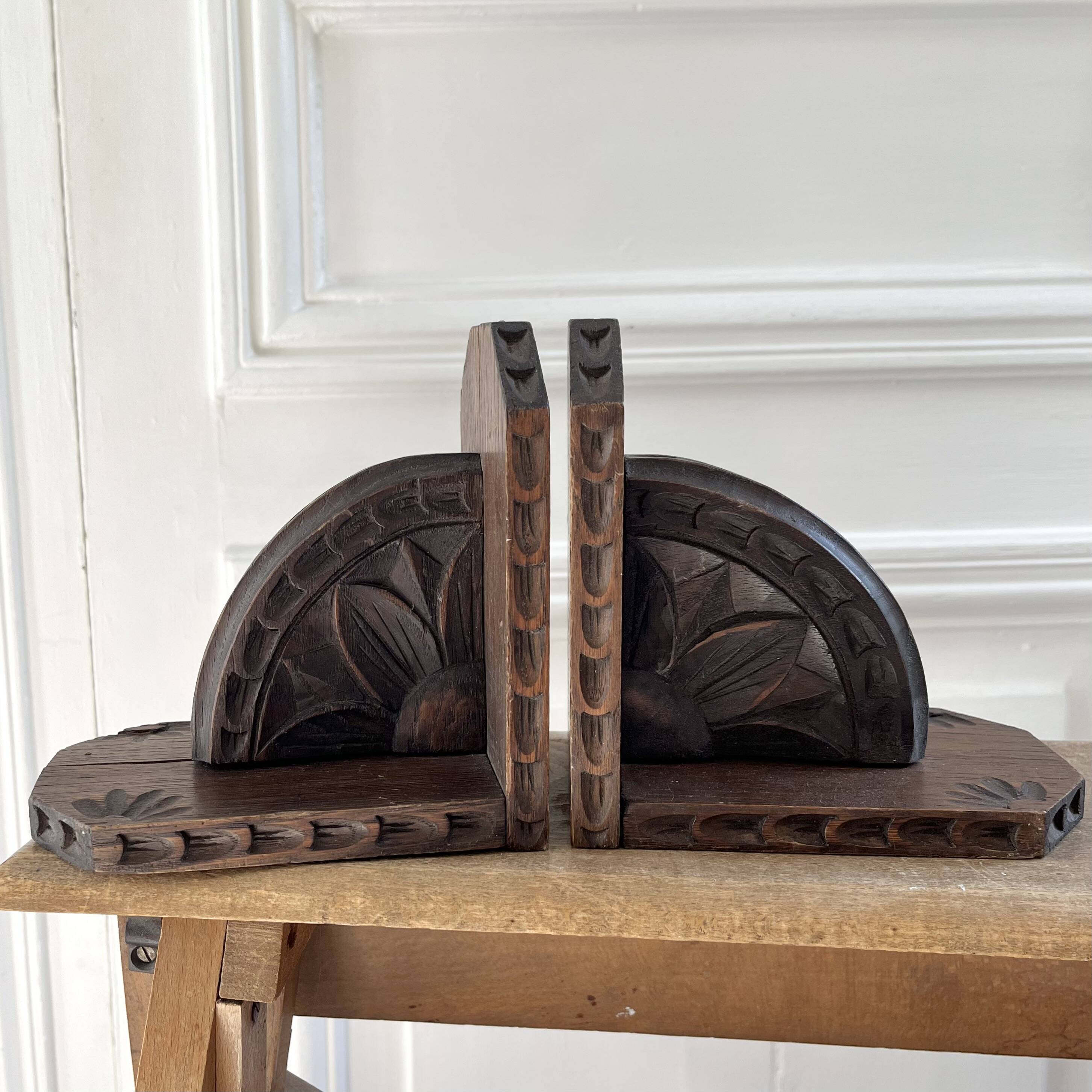 Pair of carved wooden bookends