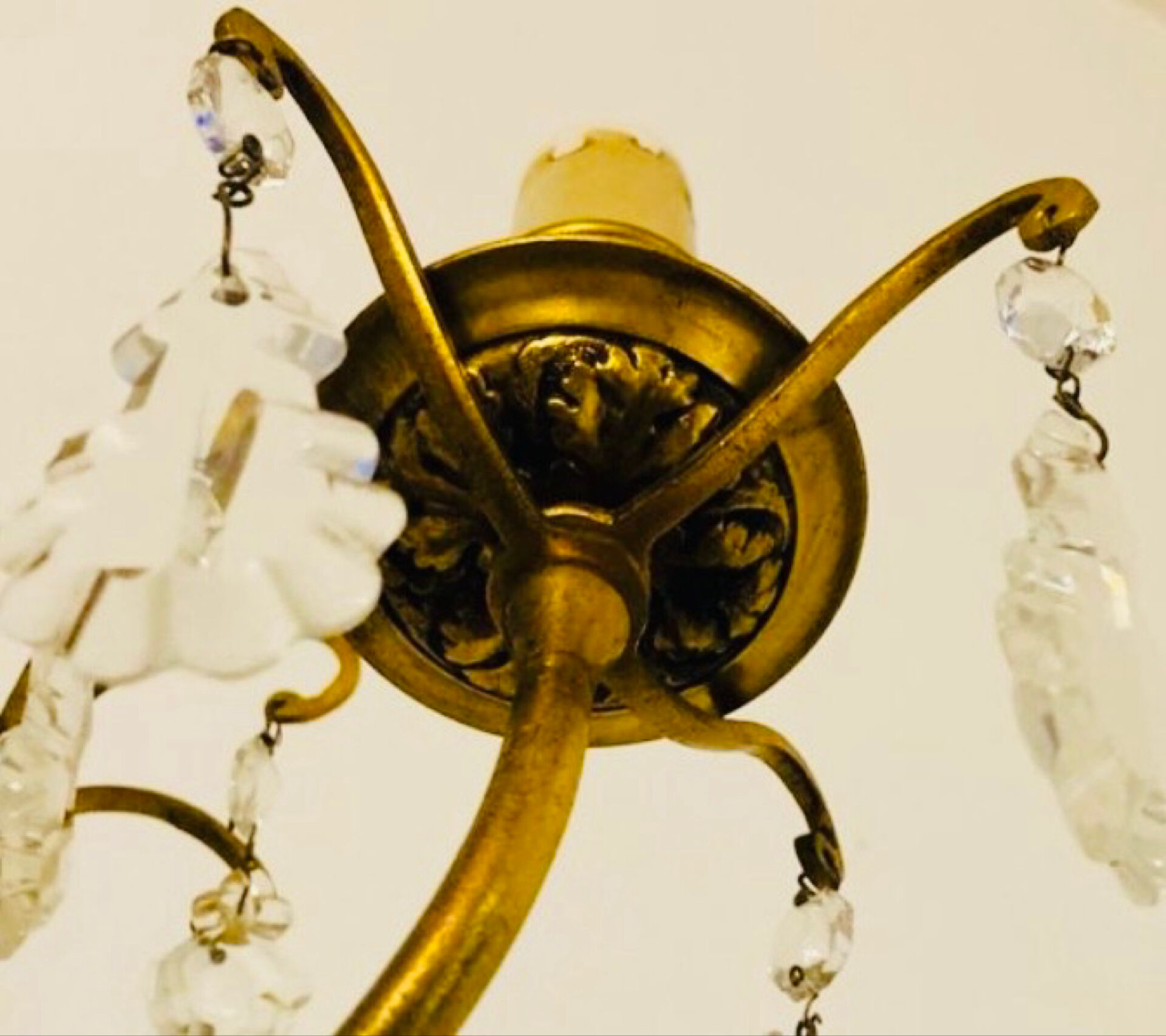 Brass wall light with glass pendants from the mid-20th century.