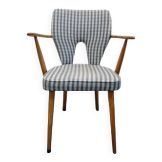 Vintage wooden chair with armrests