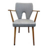 Vintage wooden chair with armrests