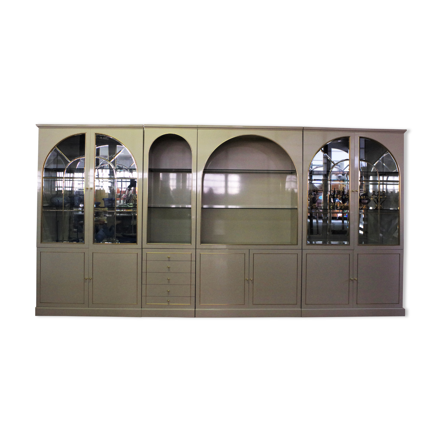 Showcases in lacquered wood, glass and brass  1970s, set of 4