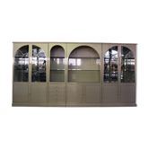 Showcases in lacquered wood, glass and brass  1970s, set of 4