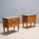 Pair of wooden and glass bedside tables from the 1950s.