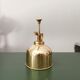 Vintage vaporizer in golden brass 70s