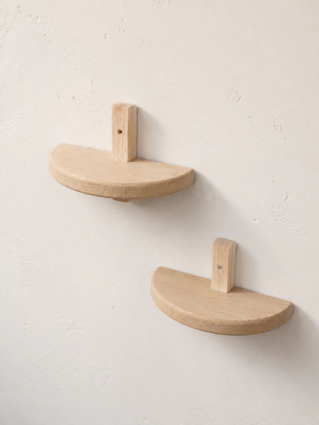 Pair of half-moon wall shelves in solid oak