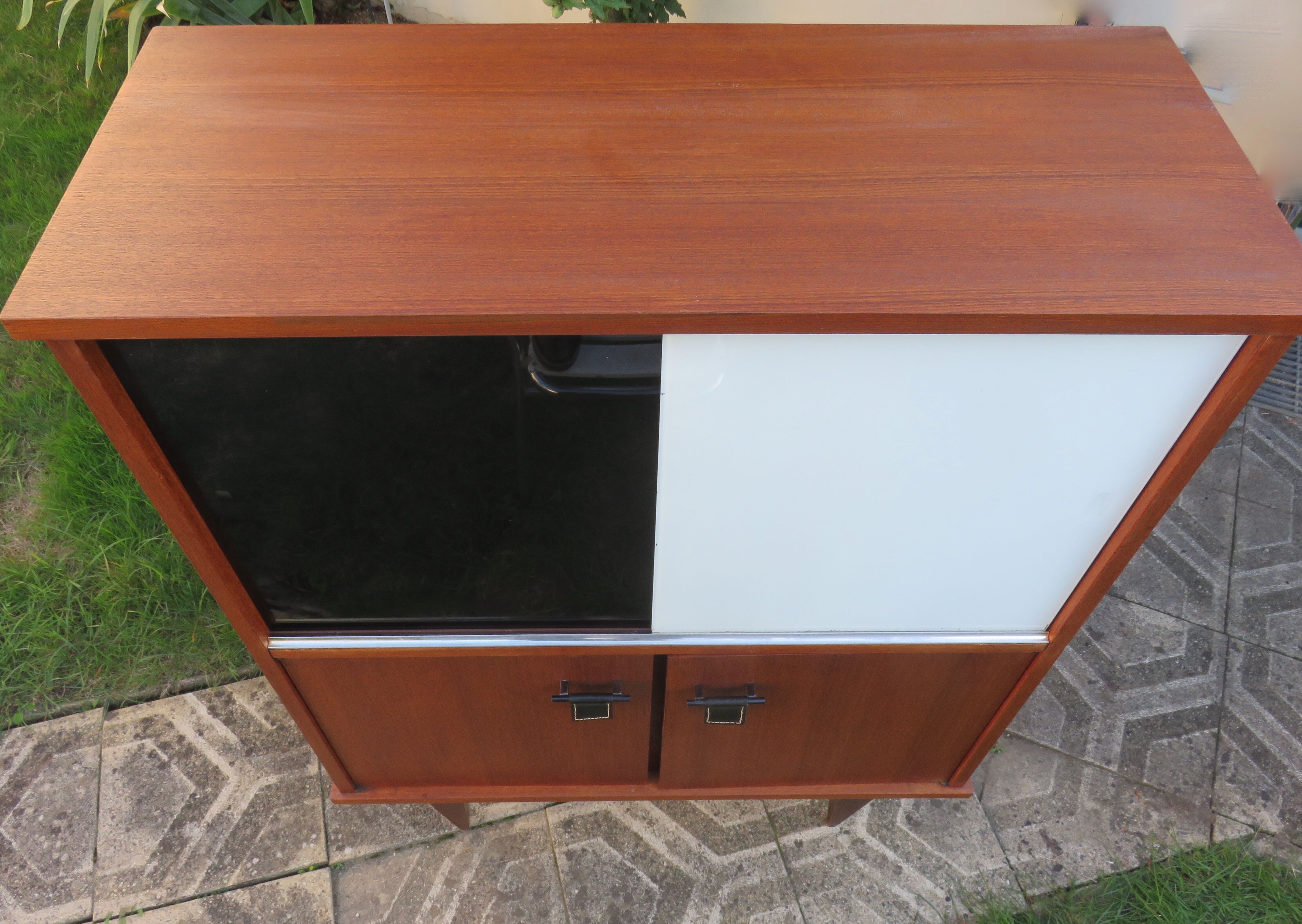 Vintage sideboard with black and white glass doors with cupboard, modernist style, France 1955