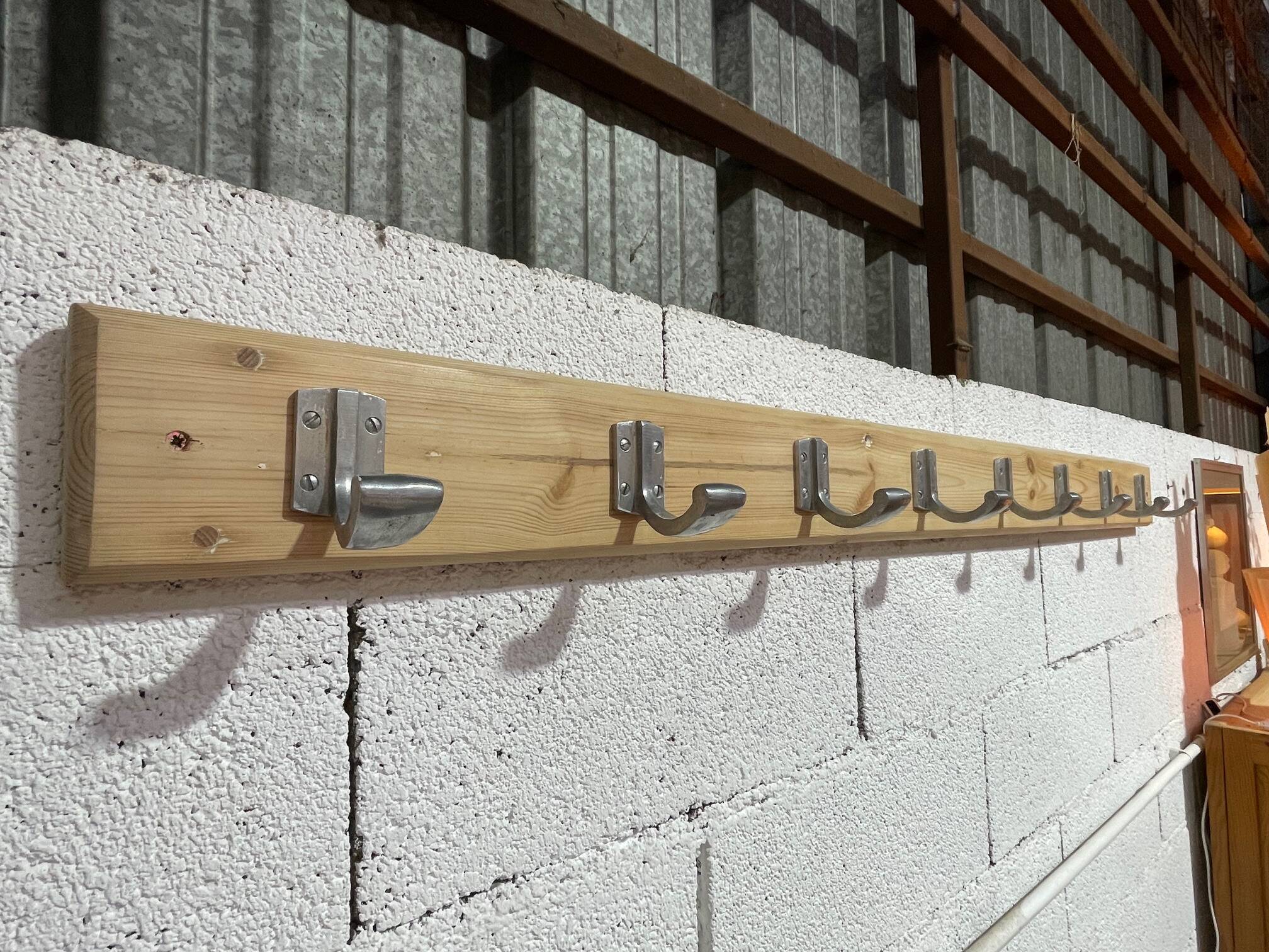 Vintage wall coat rack from the 1960s.